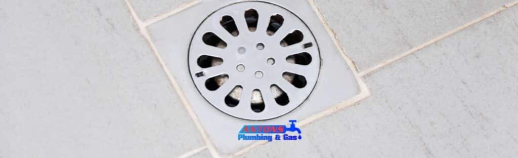 How to Fix a Floor Drain Clogged With Debris, Hair, or Grease