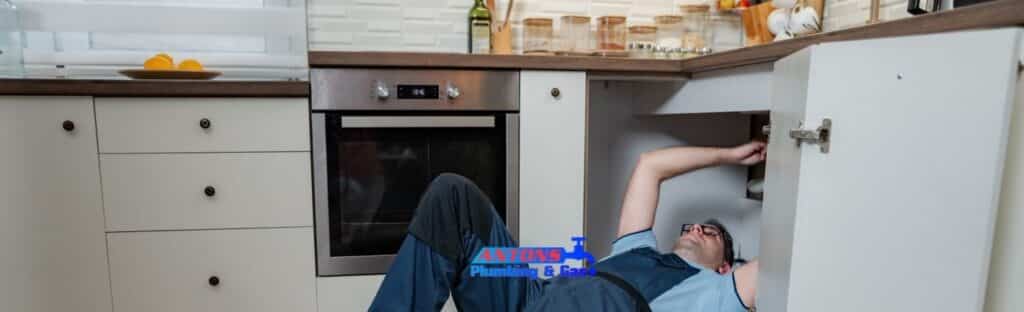 Pipe Leaking Under Kitchen Sink? Signs You Need a Plumber
